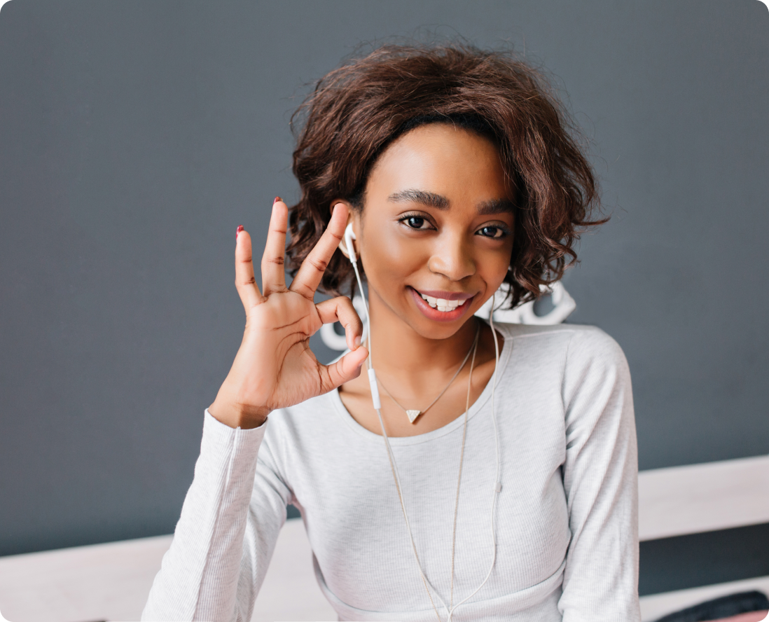 woman holding a pos machine in her hands